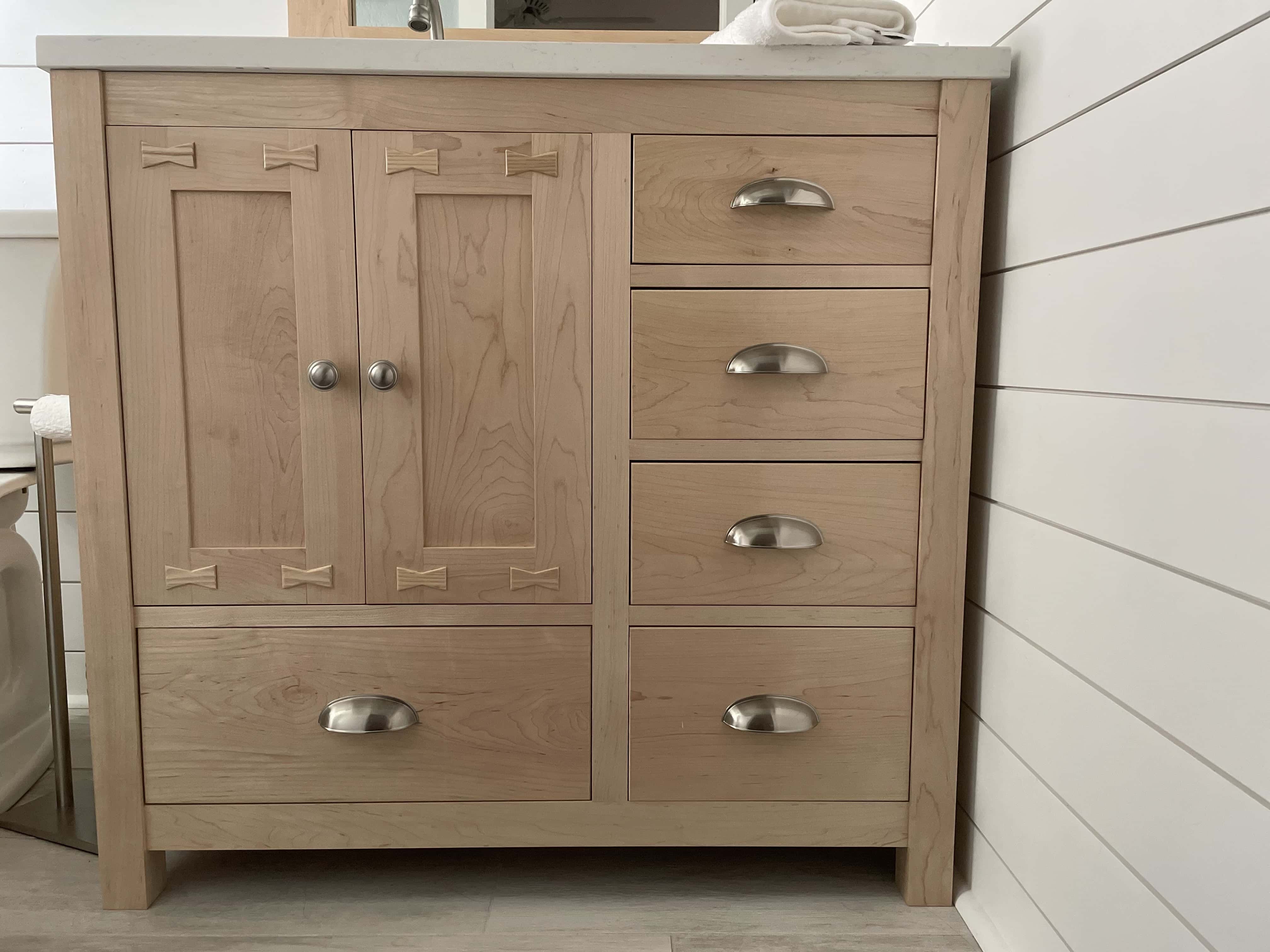 Custom wooden vanity in bathroom